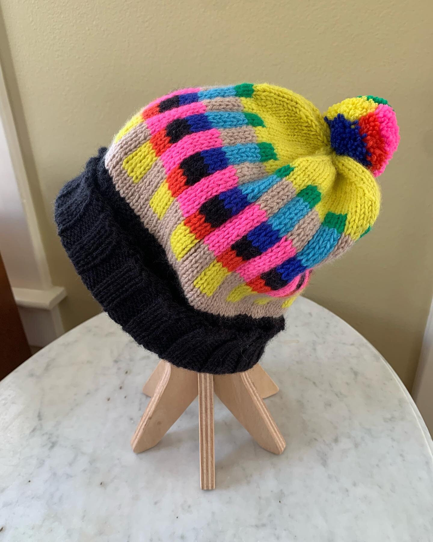 The Colourbar by @kindred.red knit up in @kaosyarn. Perfect for today. Fun, easy colorwork and no catching floats!  #hat #pompoms  #maker #makersgonnamake  #doers  #create #craft #colorworkknitting  #yourfavorite  #lys #fortcollins  #hatweather  #nev